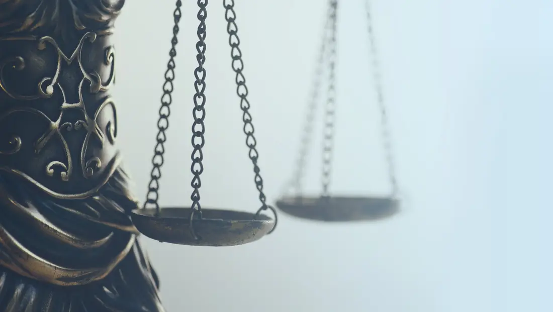 Close view of the scales of justice